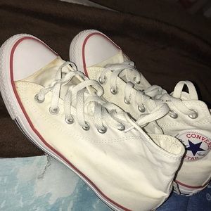white converse .